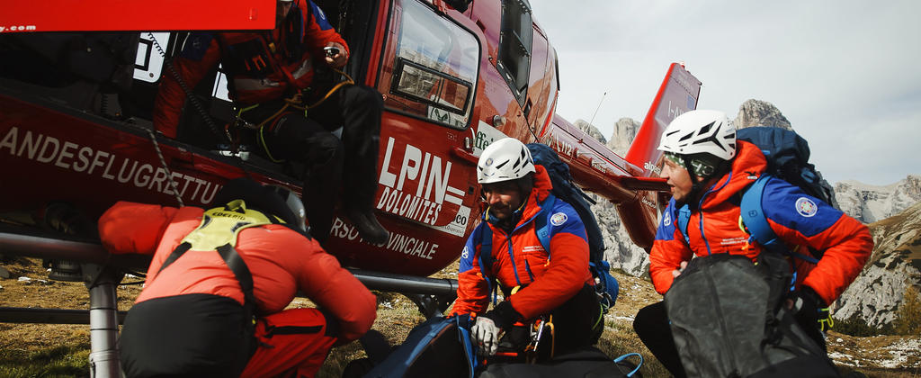 Emergency medical operators landing with a helicopter
