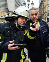 Police and fireman using Agnet map feature and firman points a point of interest