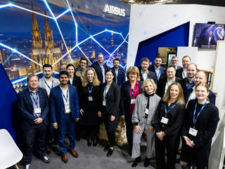 Airbus at PMRExpo 2023 - team group picture at the stand