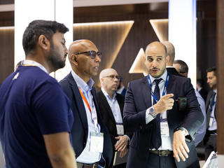 CCW 2024 in Dubai - Airbus business analyst demonstrating smart watch capabilities with Agnet