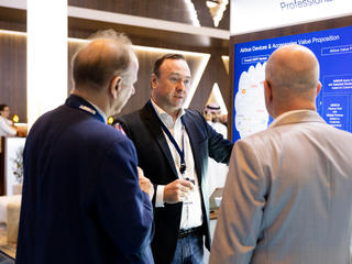 CCW 2024 in Dubai - Airbus Services manager presenting Services to two visitors