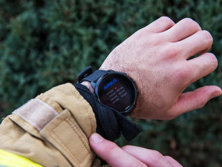 Fireman checking his vitals from a smartwatch connected to agnet
