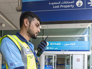 Dubai airport trolley staff with tetra radio
