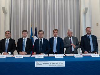 The official signing photo with Mr. Gérald Darmanin, Minister of the Interior, Mr. Guillaume Faury (CEO of Airbus), Mr. William Rozé (GM of Capgemini Engineering), Mr. Benoit Torloting (GM of Bouygues Telecom), Mr. Gervais Pellissier (Associate GM of Oran