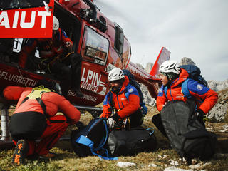 Emergency medical operators landing with a helicopter