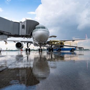 aircraft turnaround illustration with airbus plane at gate on the tarmac