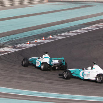 f1 race cars driving