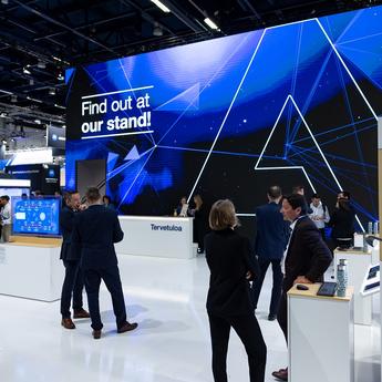 CCW 2023 - Airbus stand front view with people and big screen