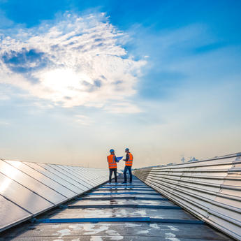 Industry workers on the roof