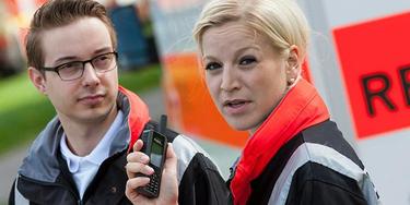 Fire and rescue professionals with TH1n radio Fire and rescue professionals with TH1n radio