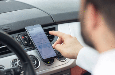 Man using application in car Man using application in car