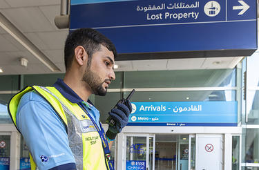 Dubai airport trolley staff with TETRA radio