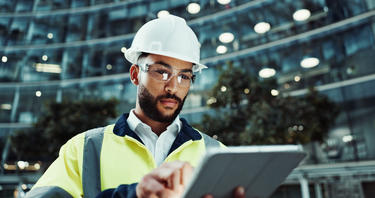 Industry worker using a tablet