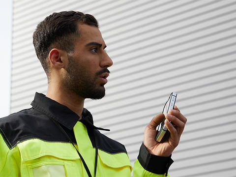 industry enterprise professional using a smartphone