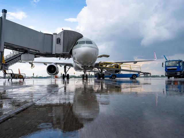 aircraft turnaround illustration with airbus plane at gate on the tarmac