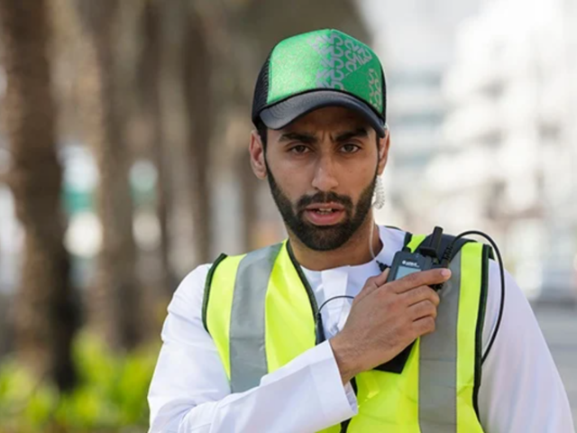 Dubai network industry user with a device