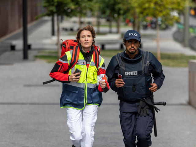 Medic and police running