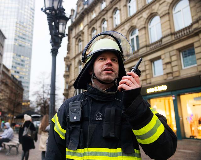 Fireman speaking to a TH9 TETRA terminal