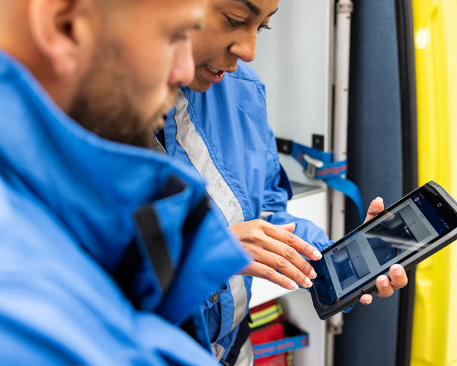 Paramedics using Agnet on a tablet