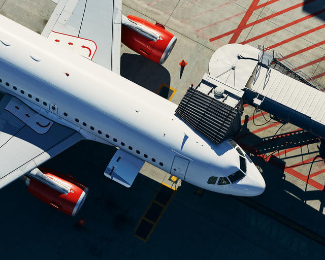 Aerial image of Airbus A320 at the gate during a turnaround