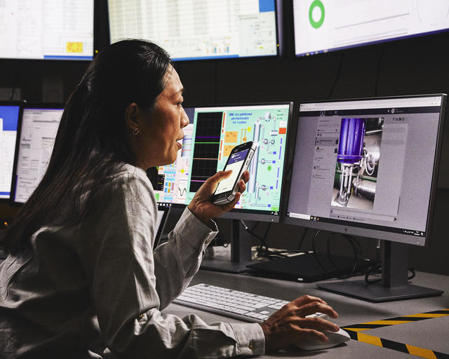 Command room operator monitoring the situation at the field and informing others with Agnet Command room operator monitoring the situation at the field and informing others with Agnet