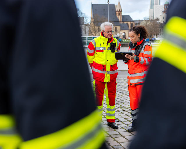 Paramedics discussing a topic Paramedics discussing a topic