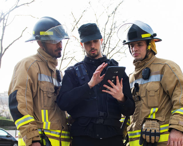 Private Security officer providing a situational update with Agnet on a crosscall tablet