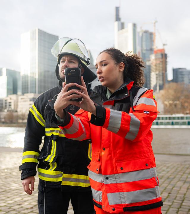Firemen with a communication device