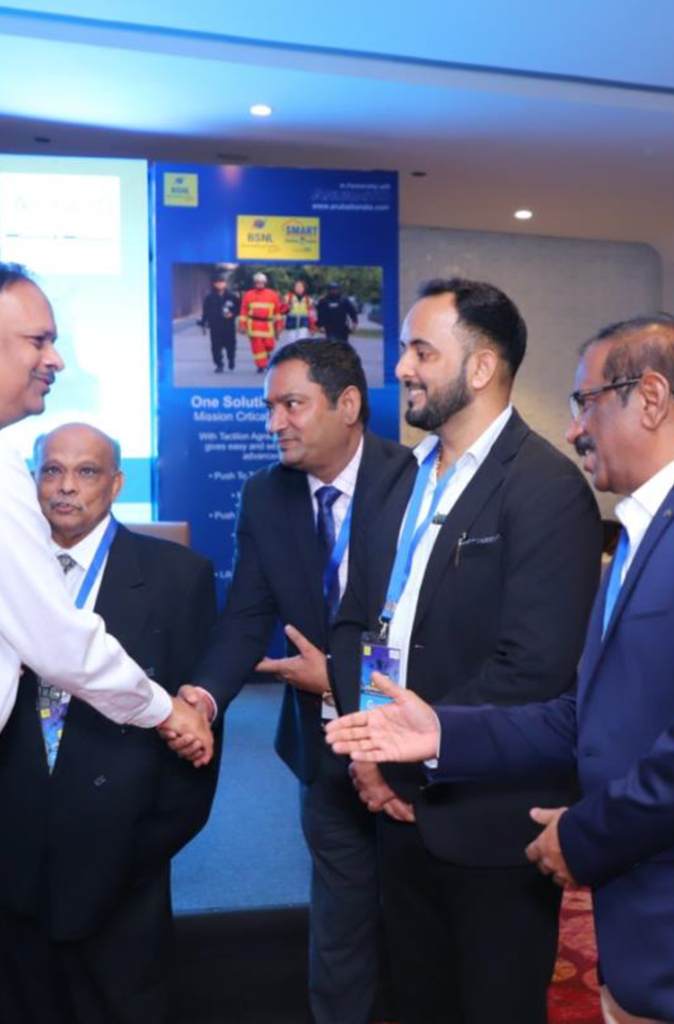 airbus bsnl india tactilon agnet 500 shaking hands at an event