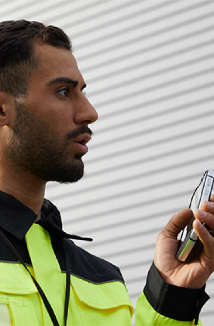 industry enterprise professional using a smartphone
