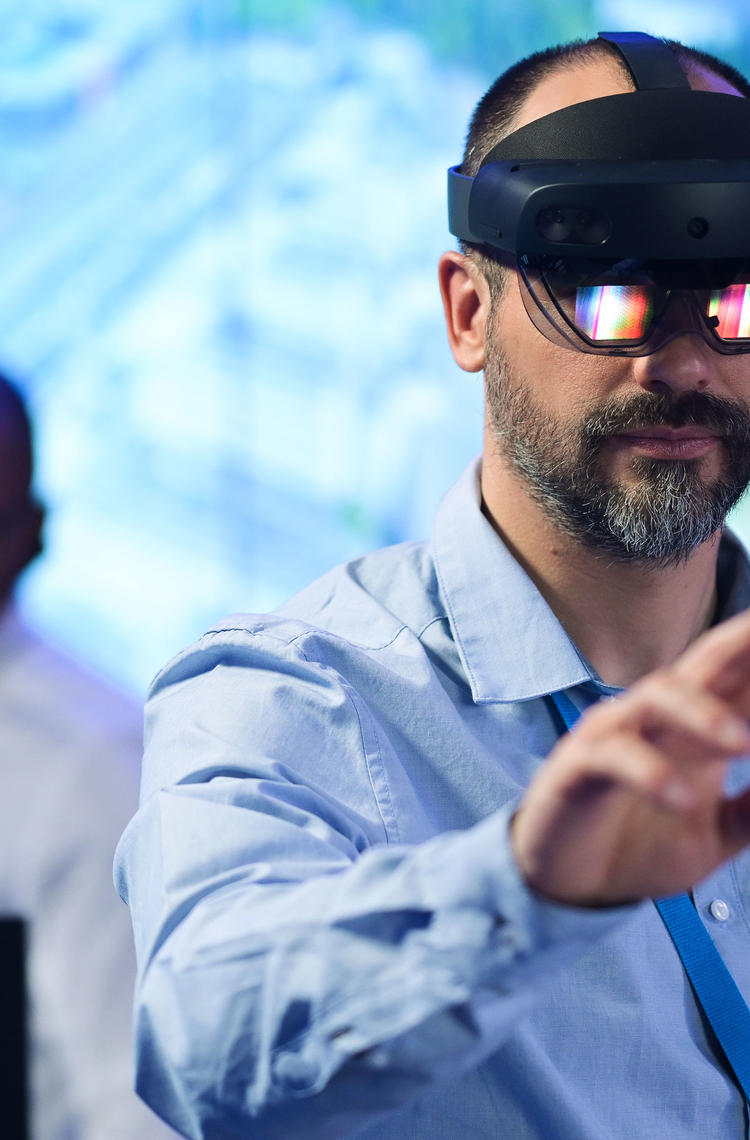 Command and control room operator using vr glasses Command and control room operator using vr glasses