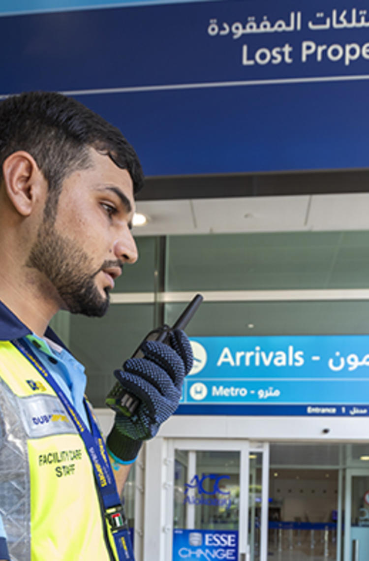 Dubai airport trolley staff with TETRA radio