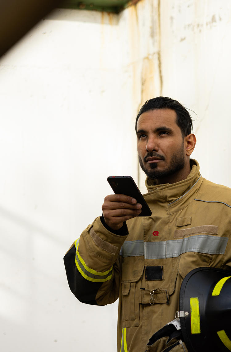 Fireman using a Agnet to communicate Fireman using a Agnet to communicate