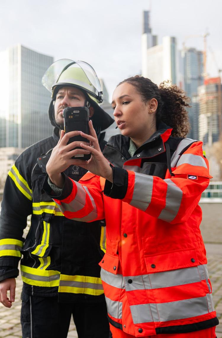 Firemen with a communication device