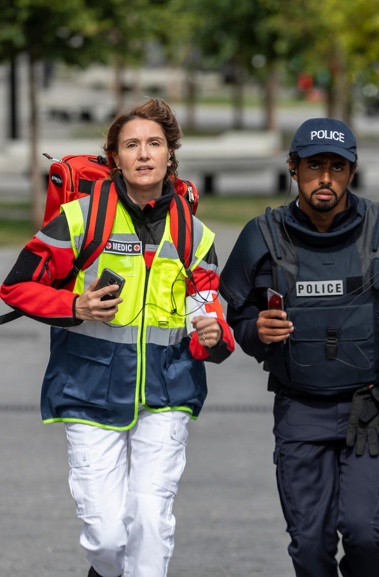 Medic and police running