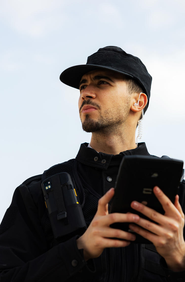 Security officer using agnet on a crosscall tablet Security officer using agnet on a crosscall tablet
