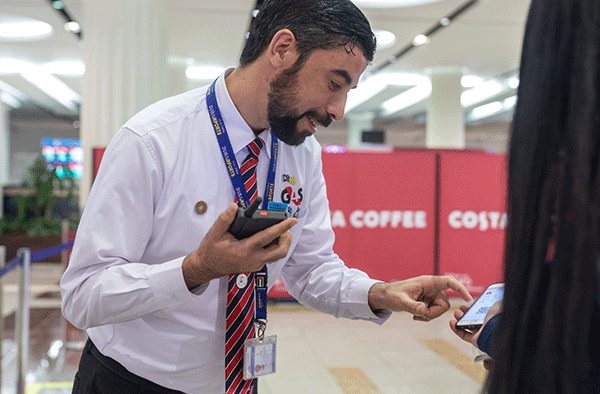 dubai airport staff with tactilon dabat device