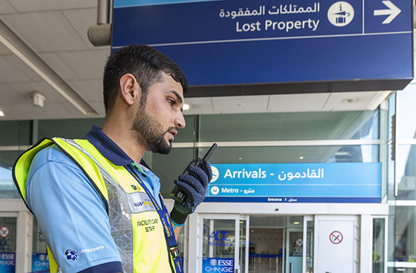 Dubai airport trolley staff with tetra radio