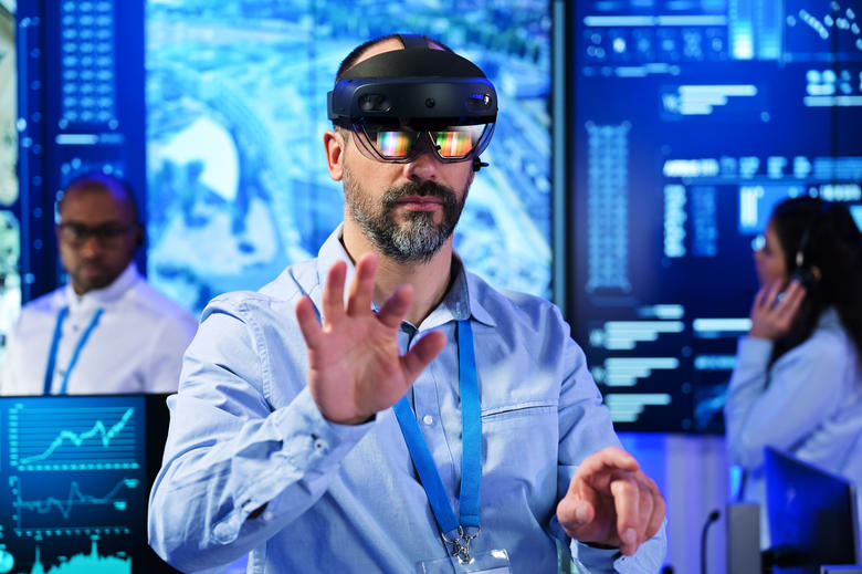 Command and control room operator using VR glasses