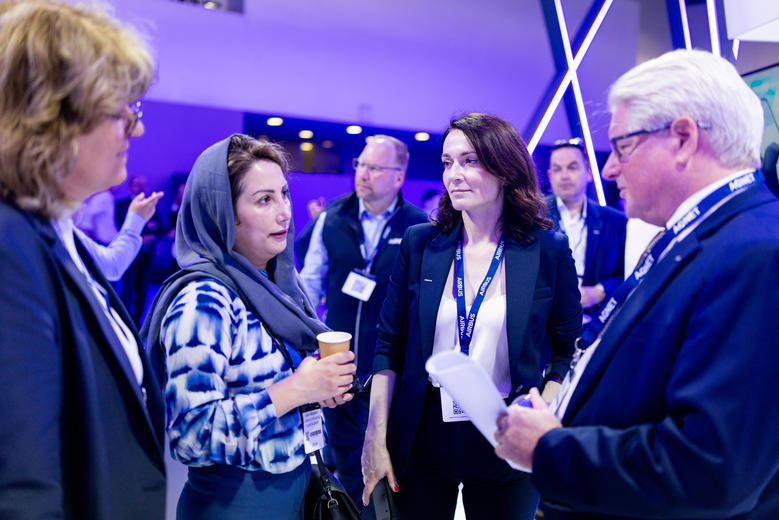CCW 2025 Airbus crew discussing with a visitor